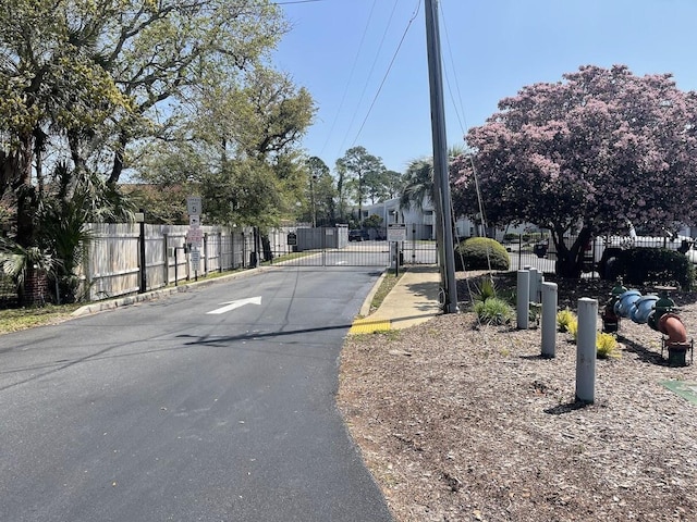 101 Old Ferry Rd Unit 5A, Shalimar, FL 32579 - view of road featuring a gate and a gated entry