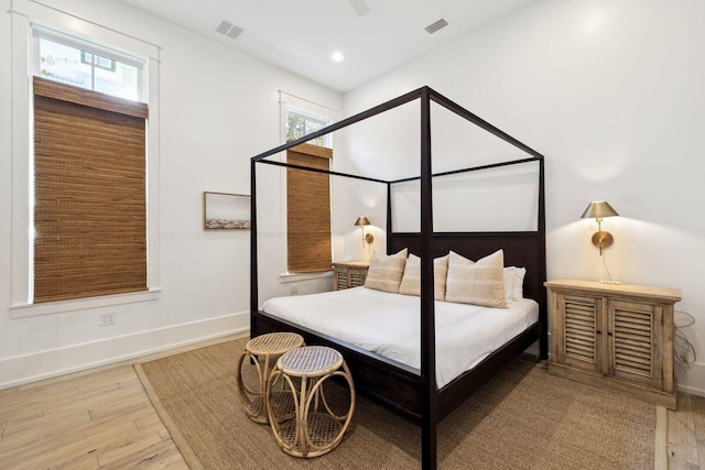 76 Tall Timber Ct, Santa Rosa Beach, FL 32459 - bedroom featuring wood finished floors, recessed lighting, baseboards, and visible vents