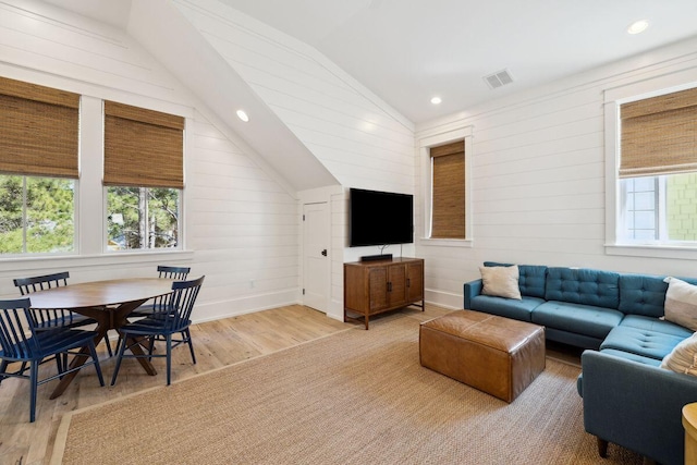 76 Tall Timber Ct, Santa Rosa Beach, FL 32459 - living area featuring visible vents, baseboards, wood finished floors, recessed lighting, and vaulted ceiling