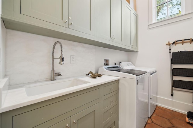 76 Tall Timber Ct, Santa Rosa Beach, FL 32459 - washroom with washing machine and clothes dryer, cabinet space, and a sink