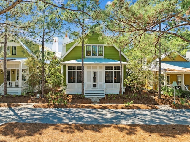76 Tall Timber Ct, Santa Rosa Beach, FL 32459 - view of front of house featuring a sunroom