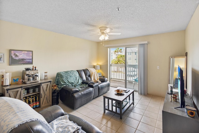 4000 Dancing Cloud Ct Unit 15, Destin, FL 32541 - living area with light tile patterned floors, a textured ceiling, and ceiling fan