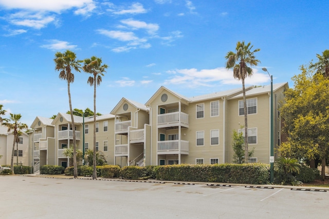 4000 Dancing Cloud Ct Unit 15, Destin, FL 32541 - view of building exterior featuring uncovered parking