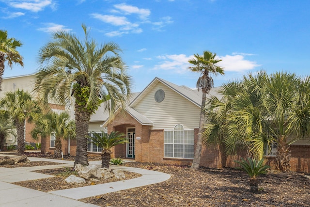 4000 Dancing Cloud Ct Unit 15, Destin, FL 32541 - view of front of house featuring brick siding
