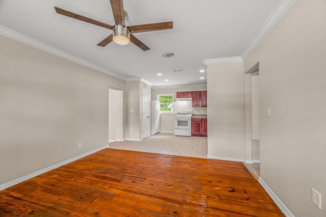 unfurnished living room featuring a ceiling fan, crown molding, light wood-type flooring, baseboards, and recessed lighting