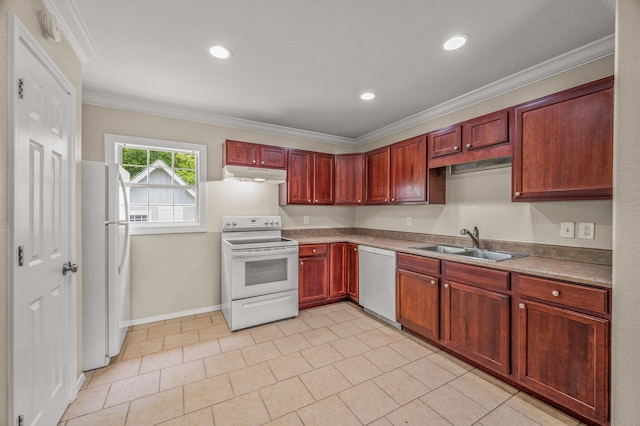 kitchen featuring white appliances, a sink, reddish brown cabinets, under cabinet range hood, and crown molding