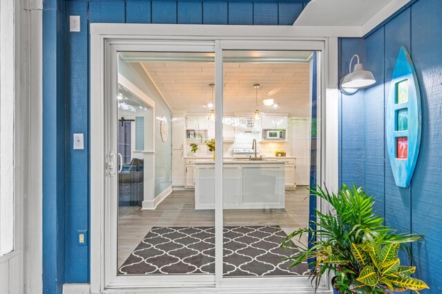 entrance to property featuring a sink