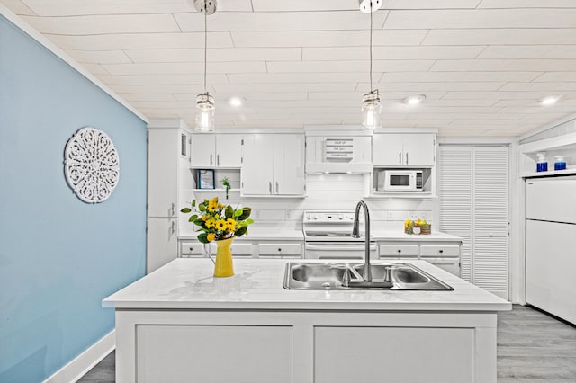 kitchen featuring a sink, white cabinetry, white appliances, open shelves, and light countertops