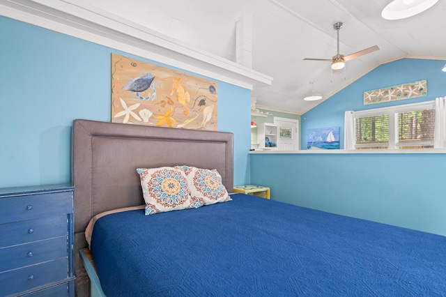 bedroom with a ceiling fan and lofted ceiling