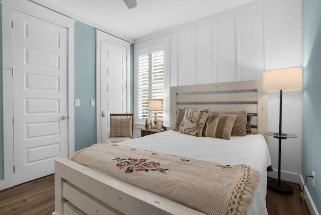 bedroom with dark wood finished floors and ceiling fan