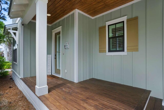 161 Lakewood Dr, Santa Rosa Beach, FL 32459 - doorway to property with board and batten siding and a porch