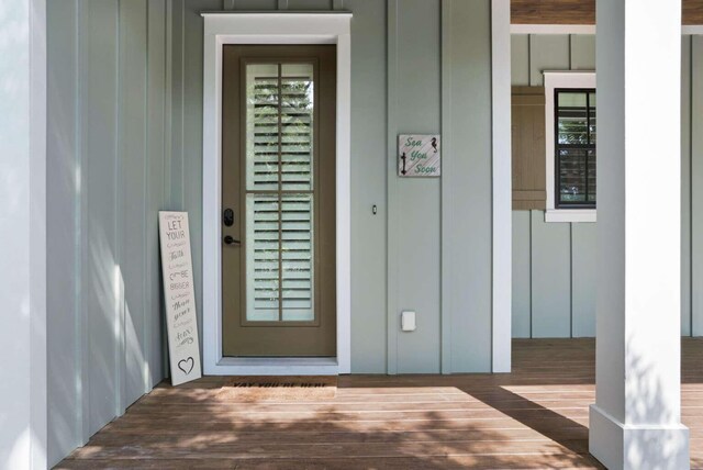 161 Lakewood Dr, Santa Rosa Beach, FL 32459 - view of exterior entry featuring board and batten siding