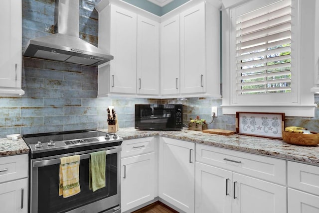 161 Lakewood Dr, Santa Rosa Beach, FL 32459 - kitchen featuring stainless steel electric stove, wall chimney range hood, white cabinets, and decorative backsplash