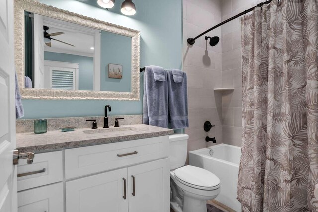 161 Lakewood Dr, Santa Rosa Beach, FL 32459 - bathroom with vanity, shower / bath combo, toilet, ceiling fan, and ornamental molding