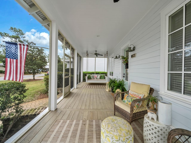 384 Carson Oaks Ln, Santa Rosa Beach, FL 32459 - wooden deck featuring covered porch and ceiling fan