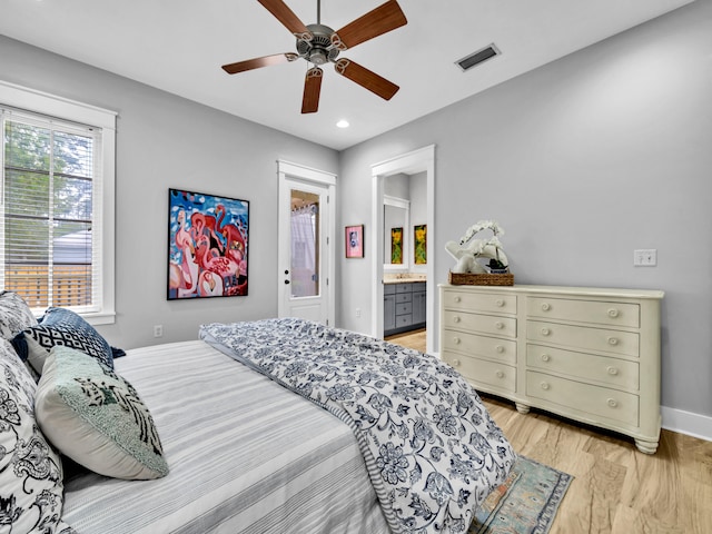 384 Carson Oaks Ln, Santa Rosa Beach, FL 32459 - bedroom with light wood finished floors, recessed lighting, baseboards, connected bathroom, and ceiling fan