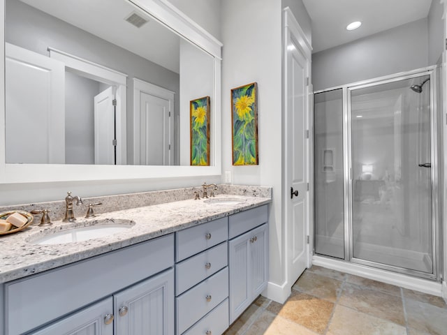 384 Carson Oaks Ln, Santa Rosa Beach, FL 32459 - full bathroom featuring a stall shower, double vanity, and recessed lighting