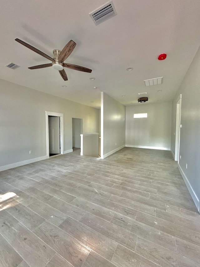 LOT11 E Georgie Pt, Washington, FL 32459 - empty room featuring light wood-style floors, a ceiling fan, and baseboards