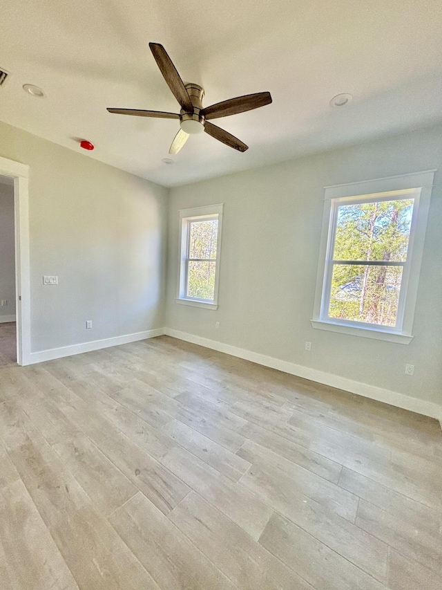 LOT11 E Georgie Pt, Washington, FL 32459 - empty room featuring light wood-style floors, ceiling fan, and baseboards
