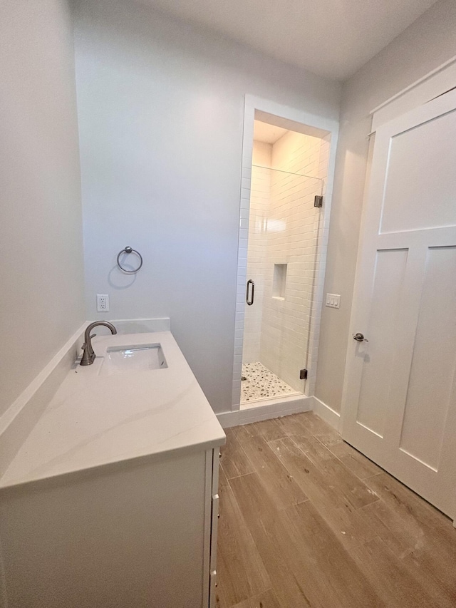 LOT11 E Georgie Pt, Washington, FL 32459 - full bath featuring wood finished floors, a stall shower, and vanity