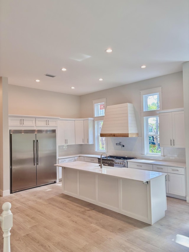 LOT11 E Georgie Pt, Washington, FL 32459 - kitchen with stainless steel built in fridge, light countertops, white cabinets, and recessed lighting