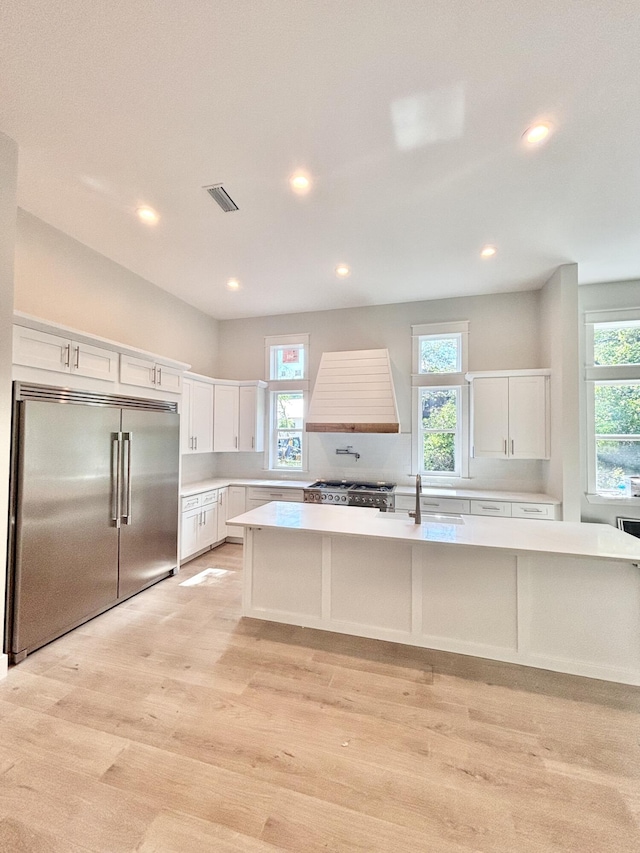 LOT11 E Georgie Pt, Washington, FL 32459 - kitchen with stainless steel built in refrigerator, custom exhaust hood, light countertops, healthy amount of natural light, and recessed lighting