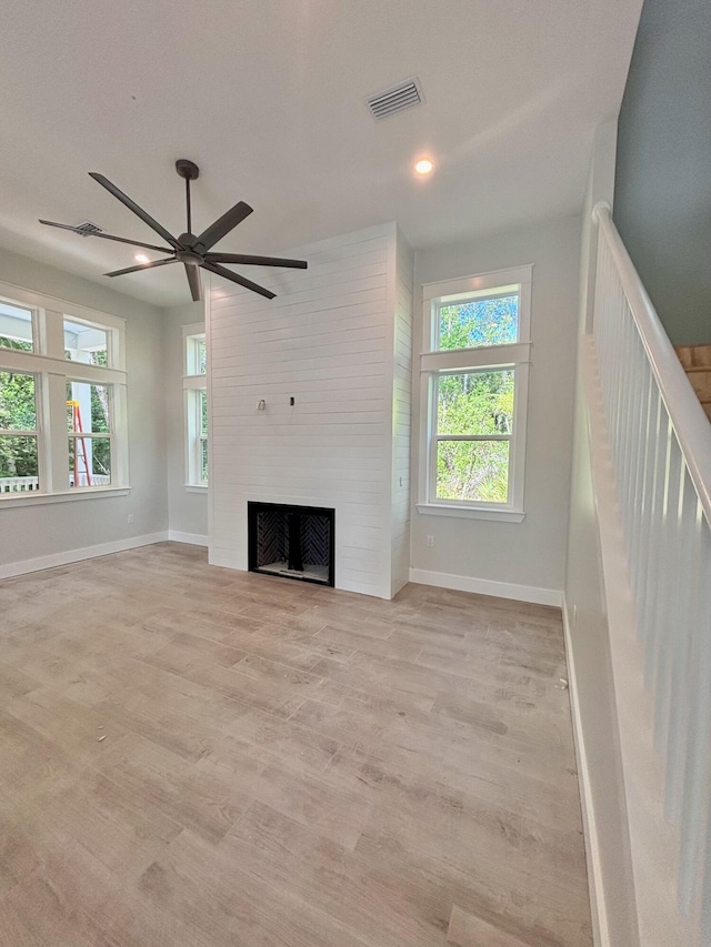 LOT11 E Georgie Pt, Washington, FL 32459 - unfurnished living room with ceiling fan, baseboards, a fireplace, light wood-style flooring, and recessed lighting