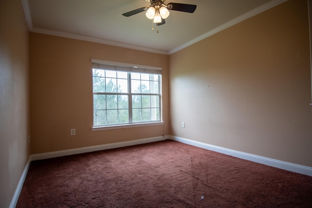 carpeted empty room featuring crown molding, baseboards, and ceiling fan