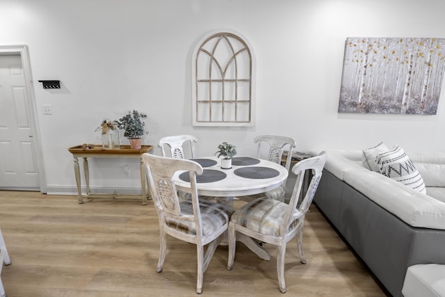 25 S Wildflower Dr Unit 224, Santa Rosa Beach, FL 32459 - dining area featuring baseboards and light wood-style flooring