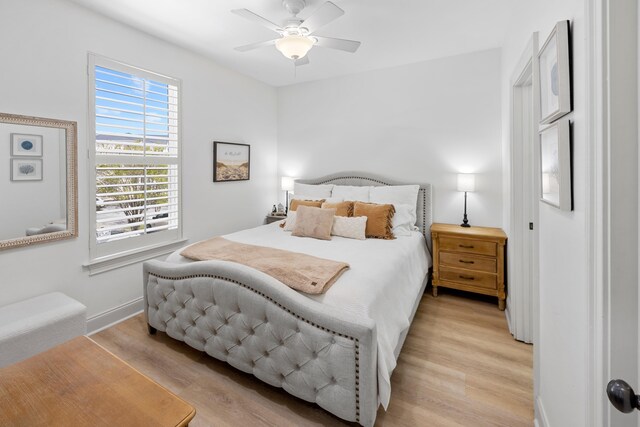 25 S Wildflower Dr Unit 224, Santa Rosa Beach, FL 32459 - bedroom with baseboards, ceiling fan, and light wood finished floors