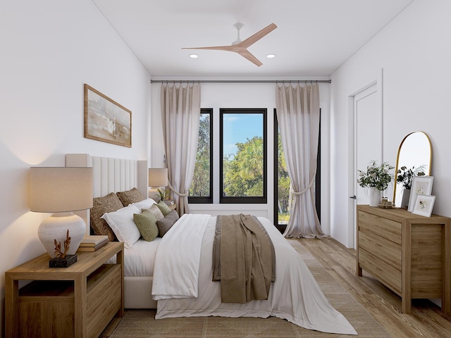 bedroom with light wood-style flooring, ceiling fan, and recessed lighting