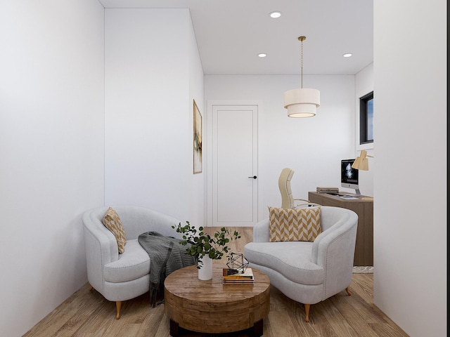 living area with recessed lighting and light wood-type flooring