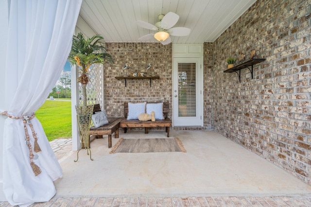 view of patio / terrace featuring ceiling fan
