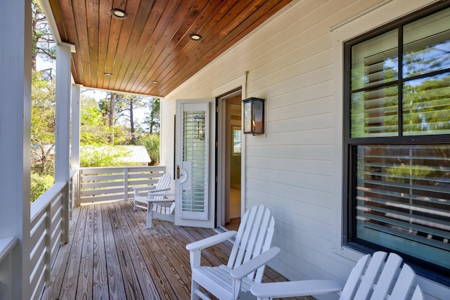 wooden terrace with covered porch