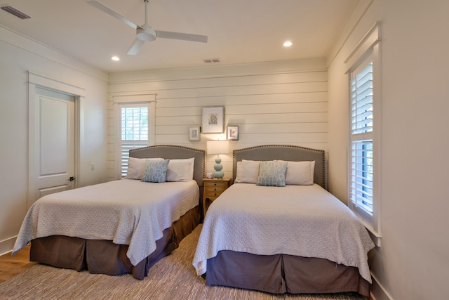 bedroom featuring recessed lighting, visible vents, and wood finished floors