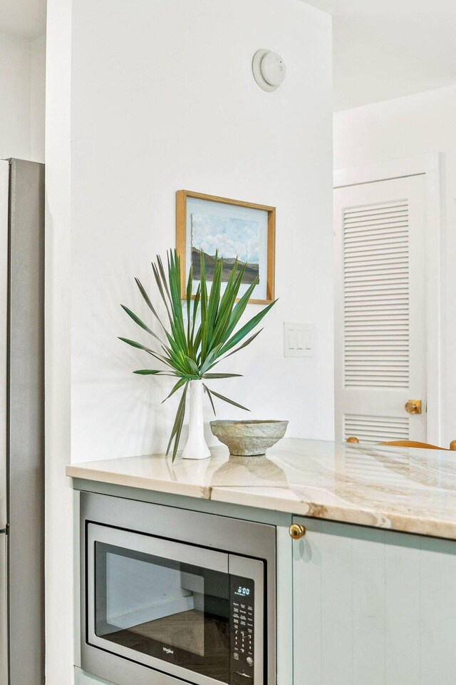 3605 E County Highway 30a Unit 236, Santa Rosa Beach, FL 32459 - details with light stone countertops and appliances with stainless steel finishes
