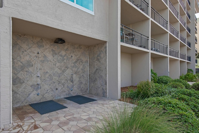 exterior space featuring stucco siding