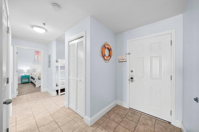 9860 S Thomas Dr Unit 501, Panama City Beach, FL 32408 - foyer entrance featuring baseboards and light tile patterned floors
