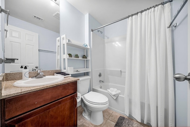 9860 S Thomas Dr Unit 501, Panama City Beach, FL 32408 - bathroom with tile patterned floors, visible vents, toilet, and shower / tub combo with curtain