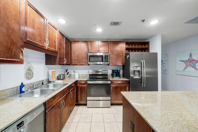9860 S Thomas Dr Unit 501, Panama City Beach, FL 32408 - kitchen featuring visible vents, recessed lighting, appliances with stainless steel finishes, a sink, and light tile patterned floors