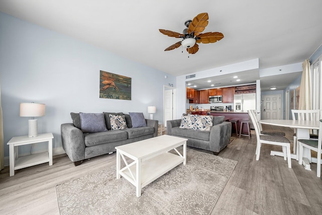 9860 S Thomas Dr Unit 501, Panama City Beach, FL 32408 - living room with light wood-type flooring, visible vents, recessed lighting, and a ceiling fan