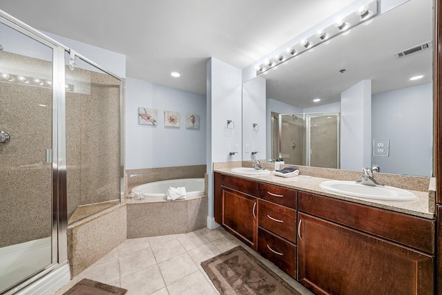 9860 S Thomas Dr Unit 501, Panama City Beach, FL 32408 - full bath featuring a sink, visible vents, tile patterned floors, and a stall shower
