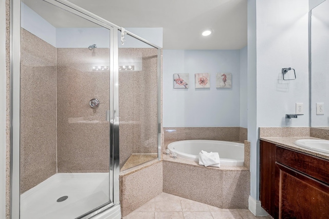9860 S Thomas Dr Unit 501, Panama City Beach, FL 32408 - bathroom featuring tile patterned floors, vanity, a shower stall, and a bath