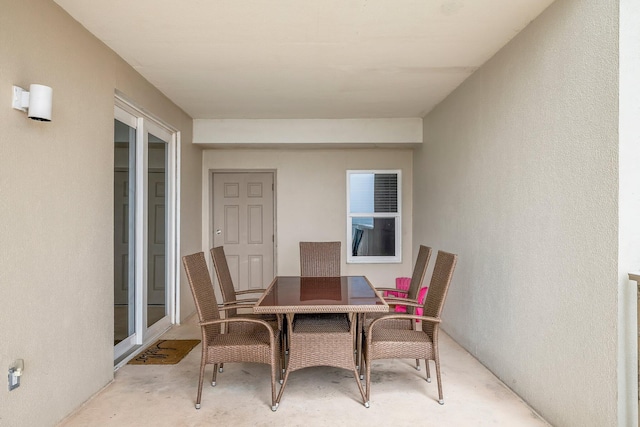 9860 S Thomas Dr Unit 501, Panama City Beach, FL 32408 - view of patio featuring outdoor dining area