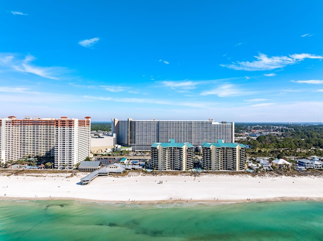 9860 S Thomas Dr Unit 501, Panama City Beach, FL 32408 - drone / aerial view featuring a water view, a view of city, and a beach view