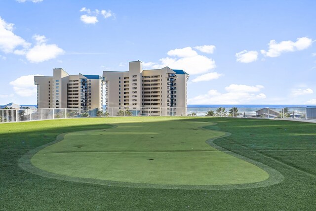 9860 S Thomas Dr Unit 501, Panama City Beach, FL 32408 - surrounding community featuring view of golf course, a water view, and fence