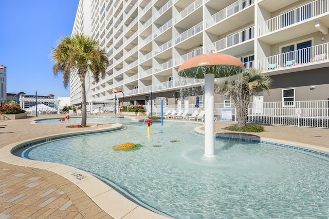 9860 S Thomas Dr Unit 501, Panama City Beach, FL 32408 - view of swimming pool featuring fence