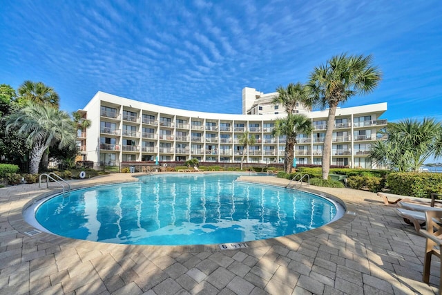 pool featuring a patio area