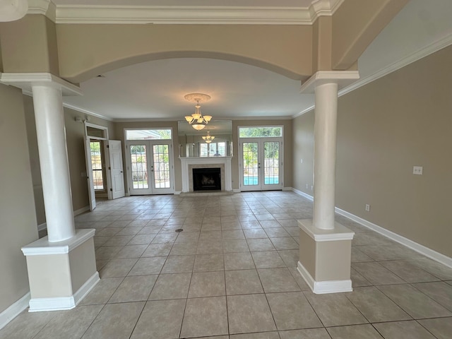 287 Stahlman Ave, Destin, FL 32541 - unfurnished living room featuring ornate columns, french doors, crown molding, and baseboards