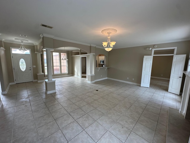 287 Stahlman Ave, Destin, FL 32541 - interior space with visible vents, arched walkways, ornamental molding, a chandelier, and ornate columns